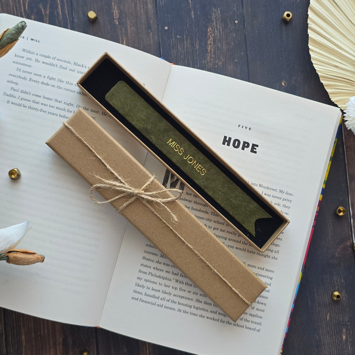 Green leather bookmark personalised with MISS JONES